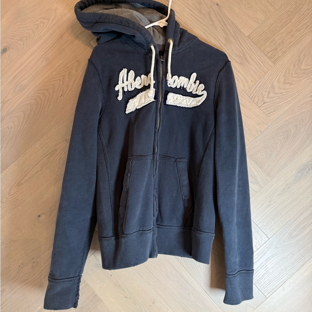 Abercrombie & Fitch Cream Label with Black Logo Accent